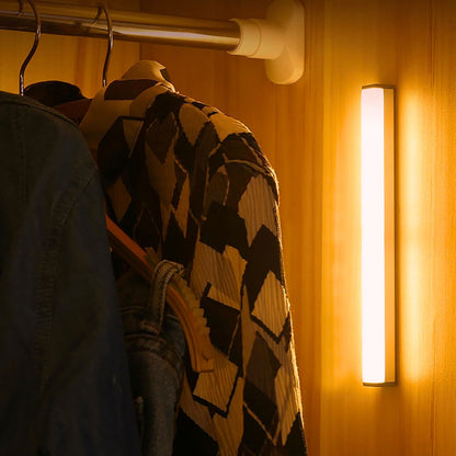 Vertical motion sensor light bar beside clothes in a wardrobe | Casa Norex
