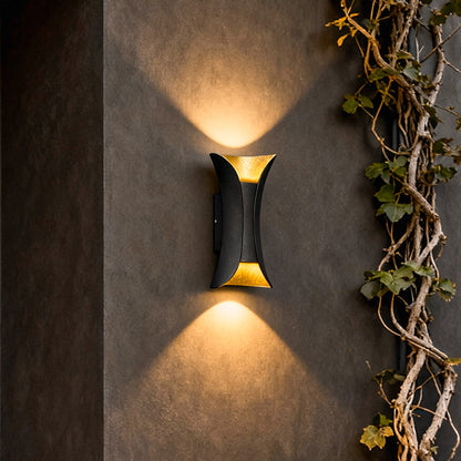 Close-up of black and gold finish on up-down wall light | Casa Norex