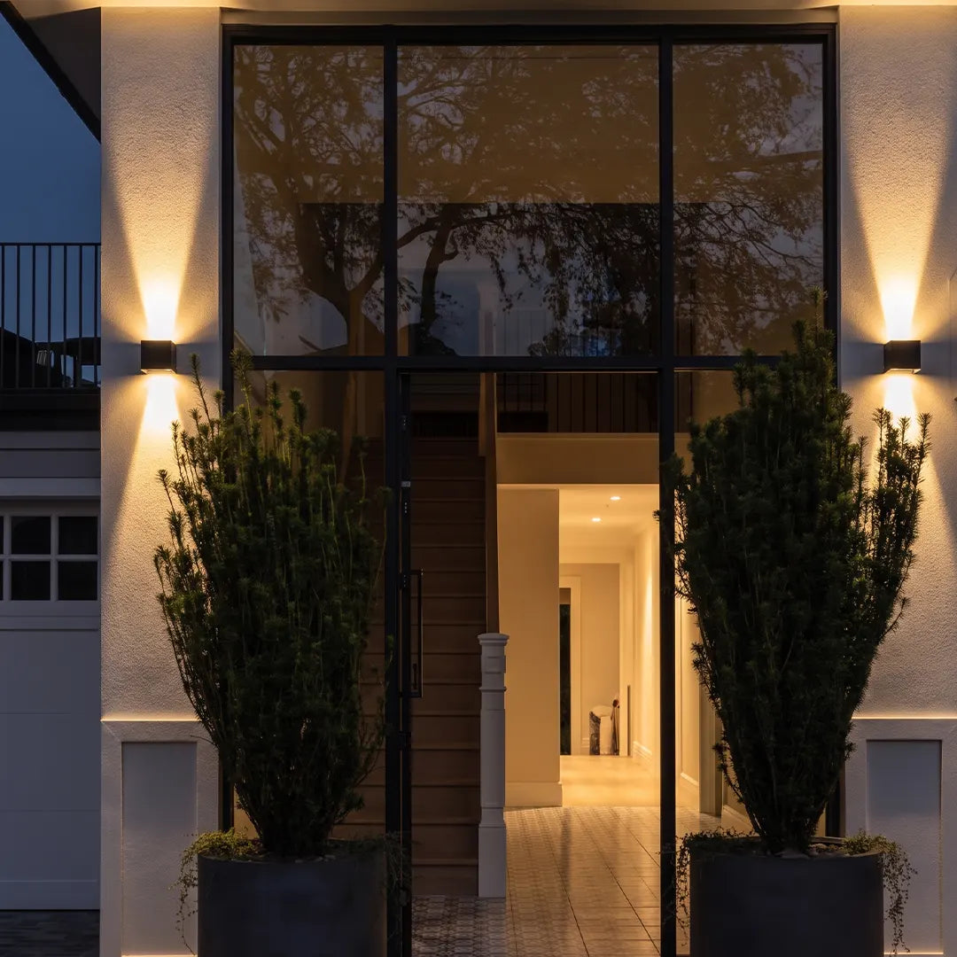 Square up down outdoor wall light at modern entry wall — Casa Norex