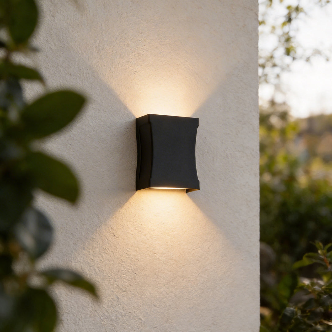 Close-up of black aluminum housing on up down outdoor wall light | Casa Norex