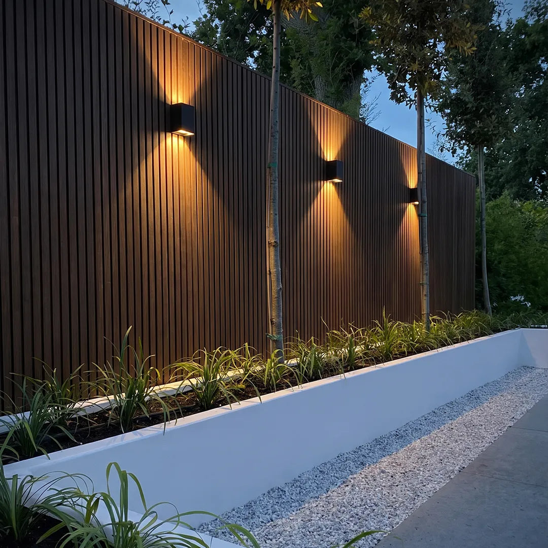 Up down outdoor wall light on garden fence — directional glow | Casa Norex
