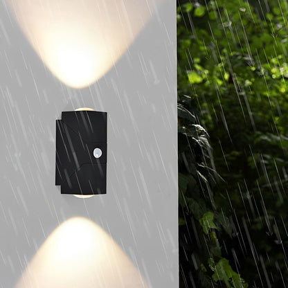 Up down outdoor wall light along garden path — focused beams | Casa Norex