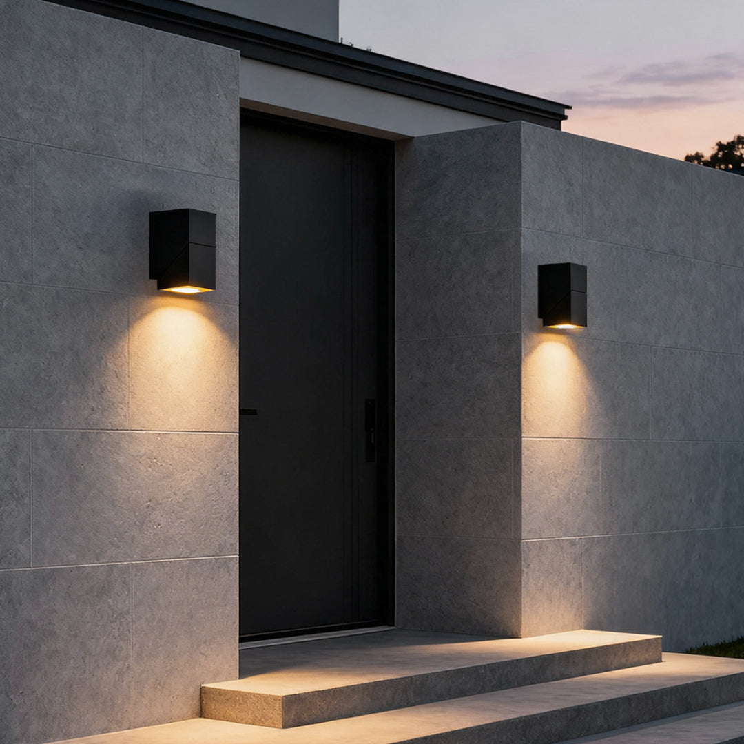 Up down outdoor wall light with warm glow at home entrance — Casa Norex