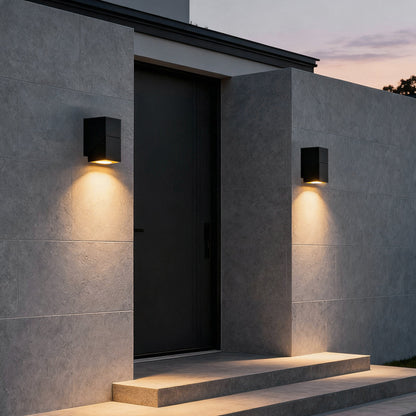 Up down outdoor wall light with warm glow at home entrance — Casa Norex