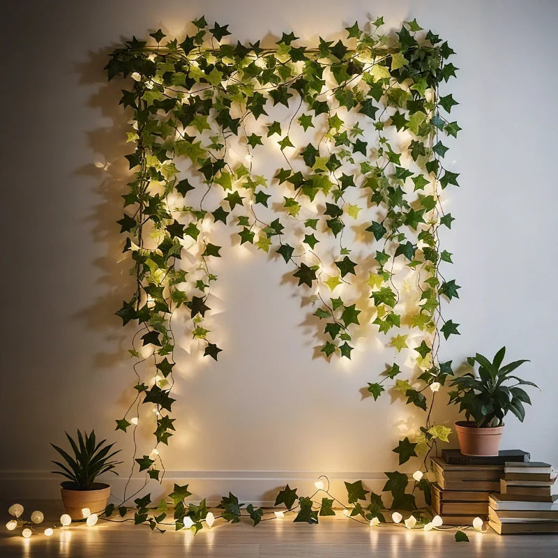 Ivy garland lights hanging down a wall and across the floor beside a plant | Casa Norex