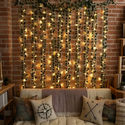 Faux vine garland lights covering a brick wall behind a sofa | Casa Norex