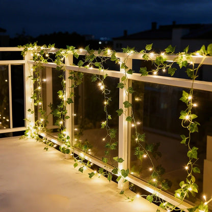 Garland lights wrapped along a balcony railing at night — Casa Norex