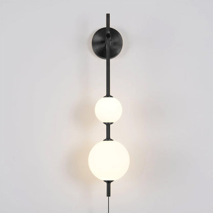 Vertical Globe wall lamp in modern living room setting - Casa Norex