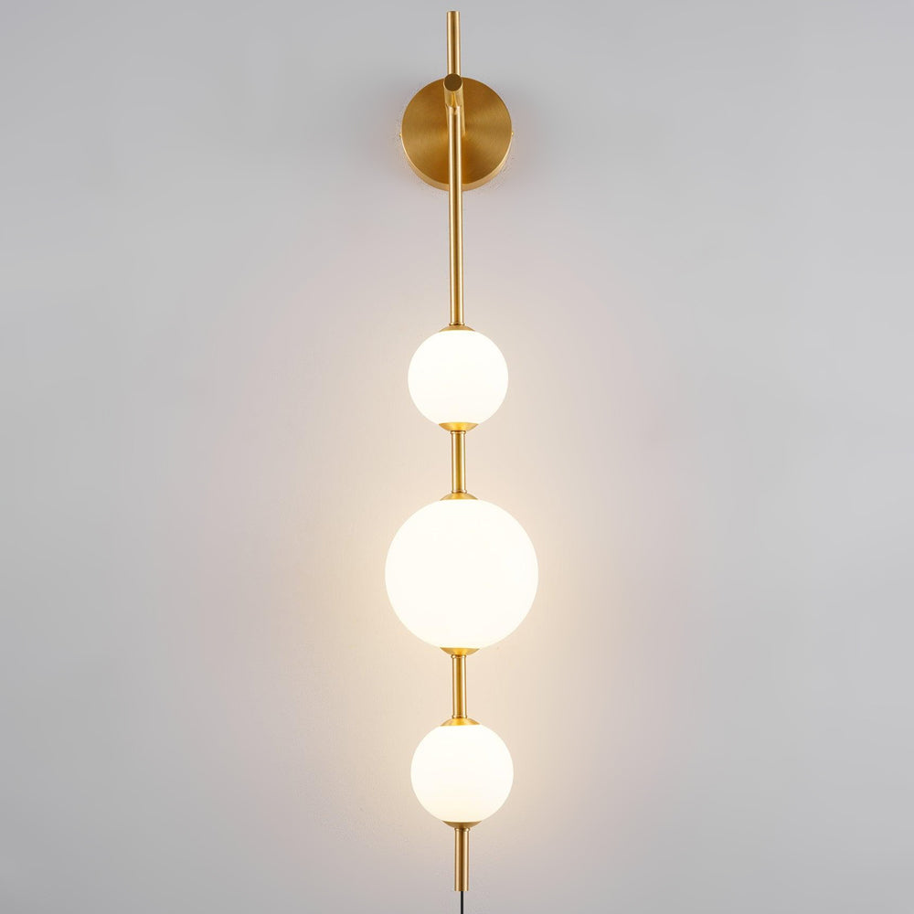 Stacked globe shade close-up - Vertical Globe plug-in wall lamp by Casa Norex