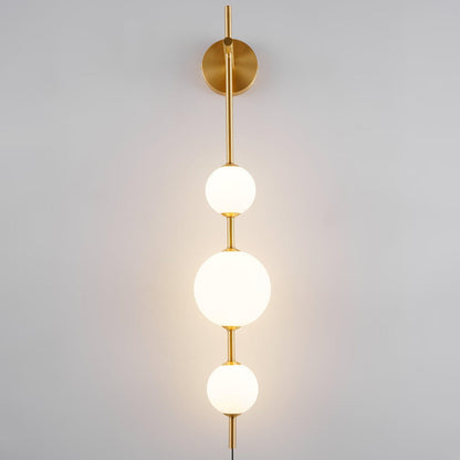 Stacked globe shade close-up - Vertical Globe plug-in wall lamp by Casa Norex
