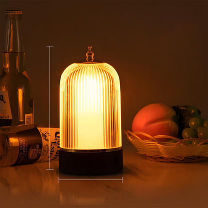 Flame-effect table lamp in bedroom setting — Casa Norex