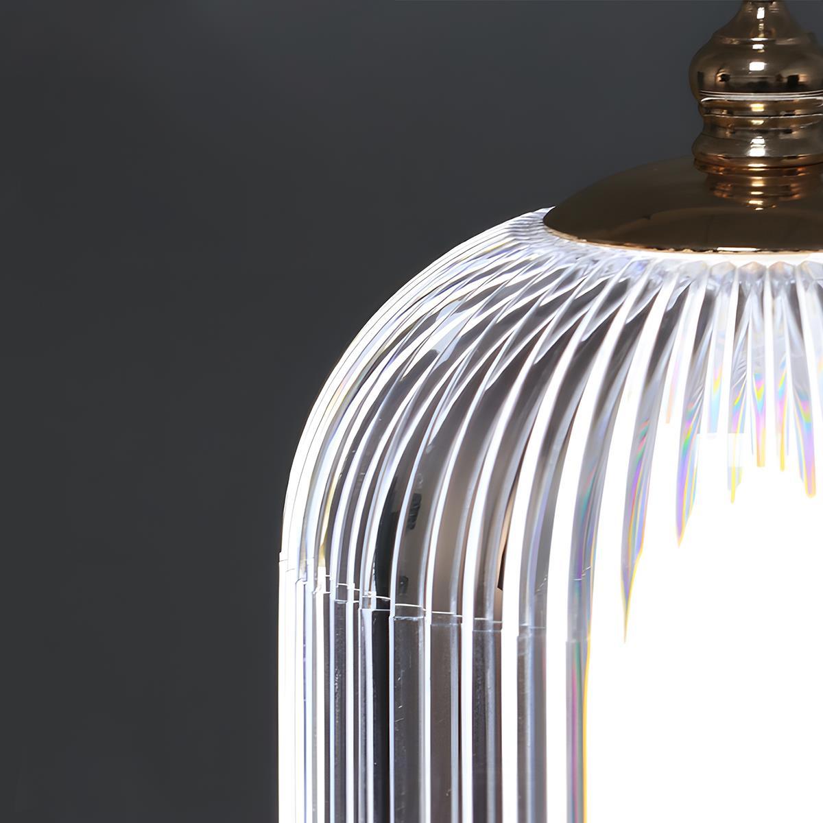 Table lamp lit at night — warm flame-effect glow — Casa Norex