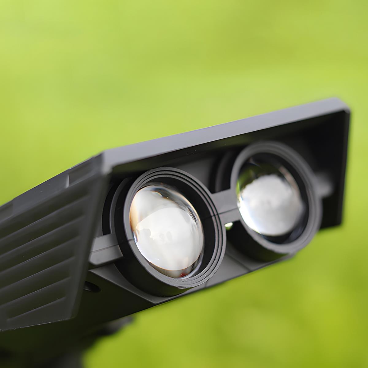 Solar spot light stake mounted in lawn — Casa Norex