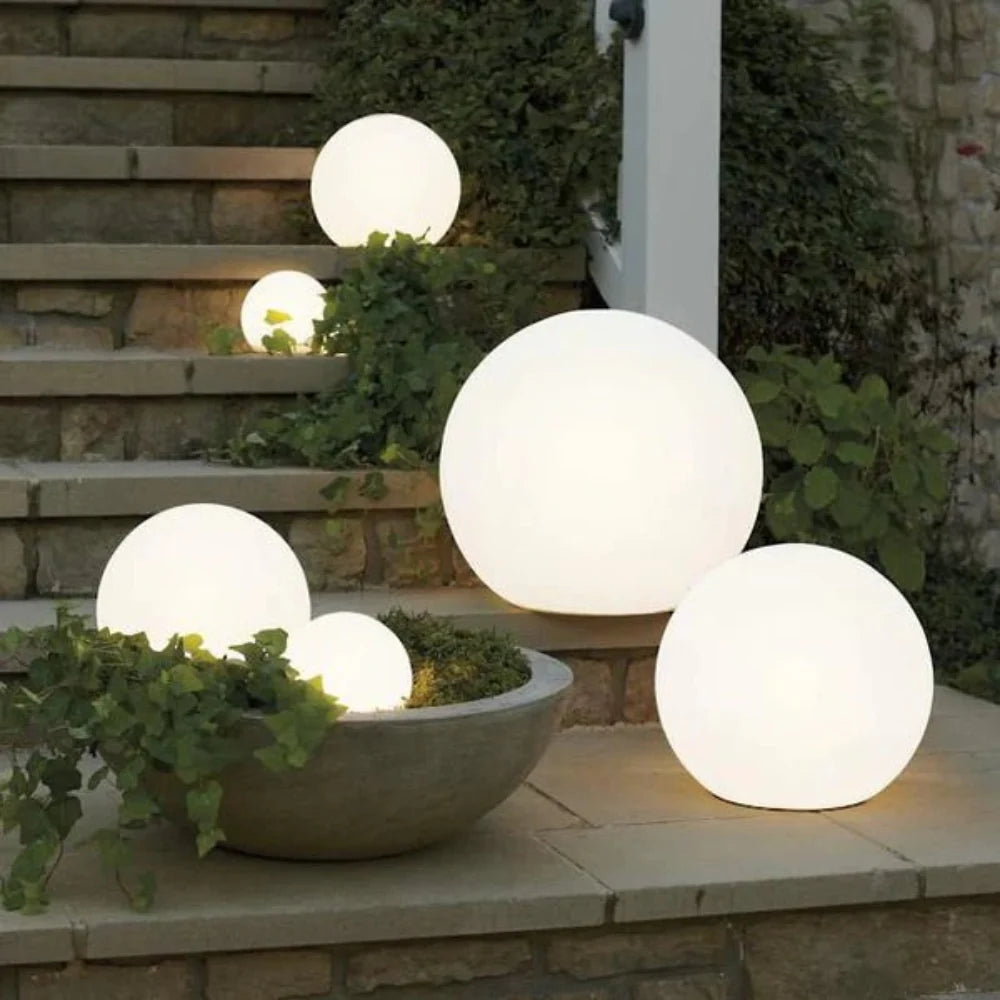 Globe light weatherproof build shown in rain-resistant outdoor use — Casa Norex